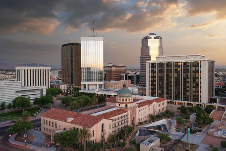 Beautiful colorful sunset over downtown Tucson, Arizona. Old Pima County courthouse in foreground.のeditorial素材