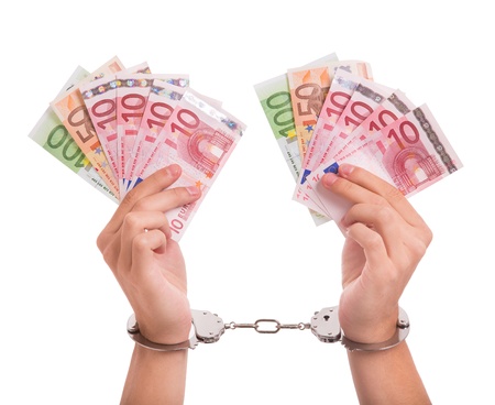 Prisoner with handcuffs and money in his hands