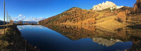 Panoramic View of a lake in the Austrian mountains of Nassfeld, Hermagor, Carinthiaの写真素材