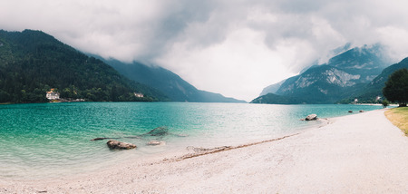 Panoramic view to the Lake Molveno in Trentino on a cloudy day in summer.の写真素材