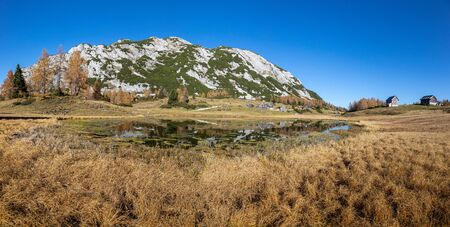 Lake Tauplitzsee on Tauplitz in the beautiful scenic Ennstal on a wonderful autumn day.の写真素材