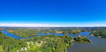 Ottenstein lake. Panorama view from above to the reservoir and the old ruin of Lichtenfels during summer. Beautiful recreation area in Waldviertel, Lower Austria.の写真素材