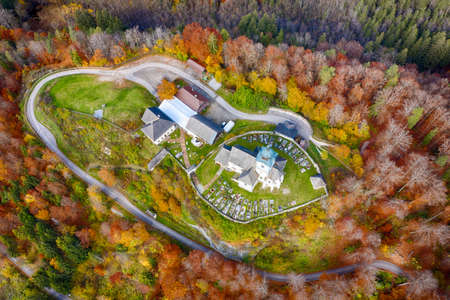 Sternberg church and idyllic graveyard in Wernberg, Carinthia, Austria during autumn.のeditorial素材