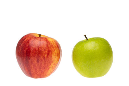 Red and green apple comparison and differentiation conceptual picture around selection and choice.の写真素材