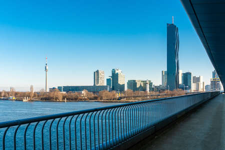 Vienna Danube Plate and Tower in Austria. View from ReichsbrÃ¼cke to the office buildings in...