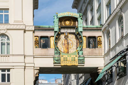 The Anchor Clock Ankeruhr in Vienna downtown district. Famous landmark and touristic destination in Austria during daytime.の写真素材