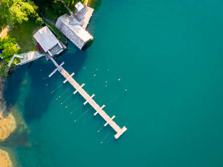 Fishing Rods at a landing stage. Aerial view to a lake. Idyllicの写真素材