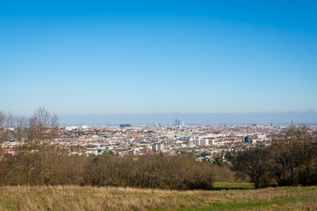 Panoramic View of Vienna in Austria from the Hillside close to Lainzer Tiergarten on a Clear Dayの写真素材