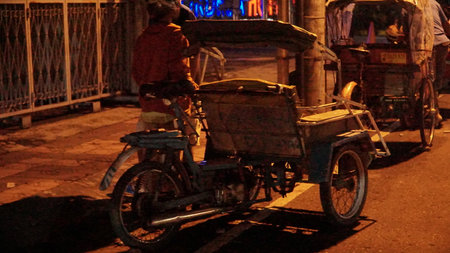 he situation of Malioboro Street in the night with street seller and visitors