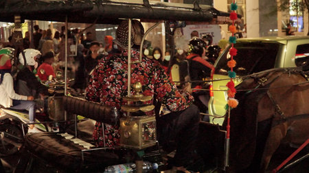 he situation of Malioboro Street in the night with street seller and visitorsのeditorial素材