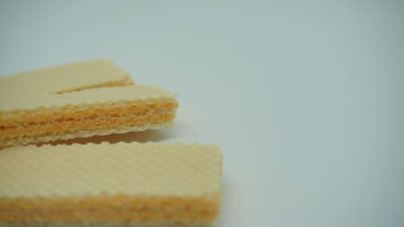 Tasty wafer sticks on white background, flat lay. Sweet foodの写真素材