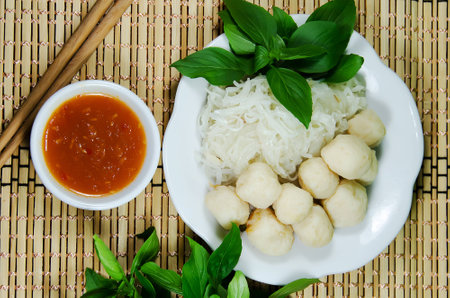 fish ball with sauce on the tableの写真素材