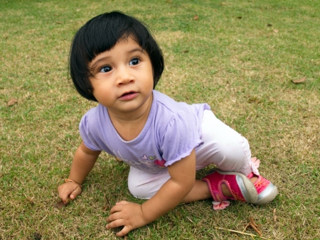 Smiling girl having fun at the playground の写真素材