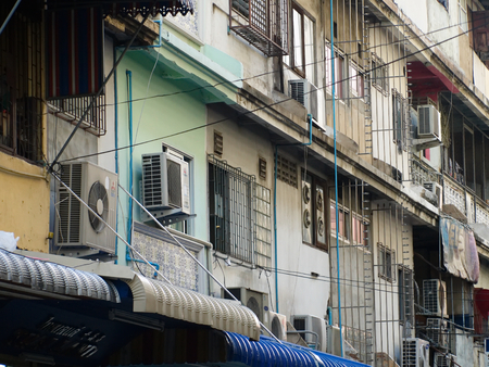 Flat block exterior in a small alley in Bangkok, Thailand.のeditorial素材