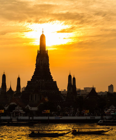 Twilight view of Wat Arun during sunset in Bangkok, Thailand