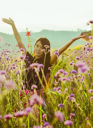 pretty woman is enjoying the sunの写真素材