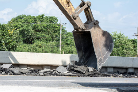 Excavation work on the construction of rural roadsの写真素材