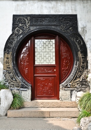 red wooden chinese gate, masterfully carved の写真素材