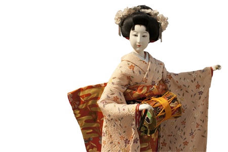 A japanese doll of a woman playing her music instrumentのeditorial素材