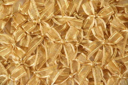 Closeup detail of gold ribbon texture background. Gold ribbon texture.の写真素材