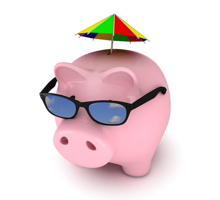 Piggy bank with sunglasses on white backgroundの写真素材