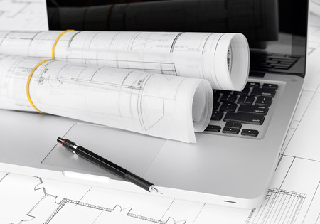 Blueprints and laptop