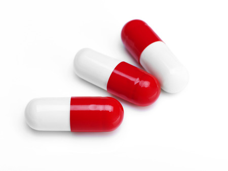 Red and white capsulesの写真素材