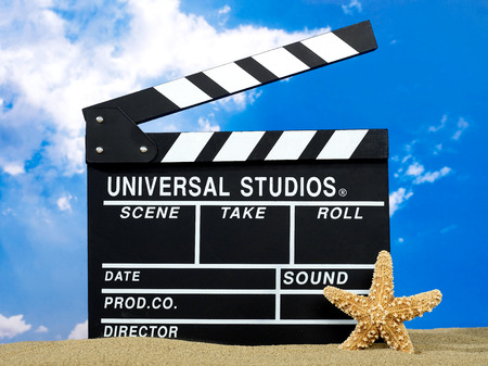 Clapper board on the beachの写真素材