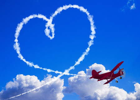Heart shaped clouds in the skyの写真素材