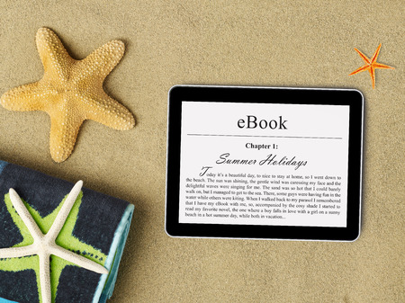 eBook tablet on beach