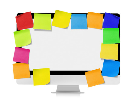 Computer with adhesive notesの写真素材