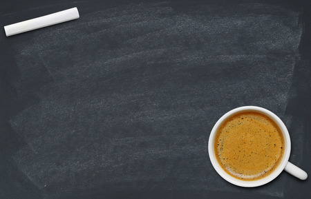 Coffee cup on blackboardの写真素材
