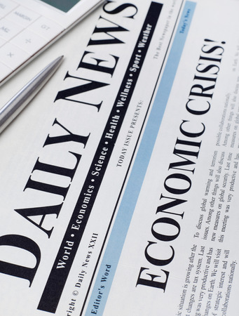 Economic crisis headline on newspaperの写真素材