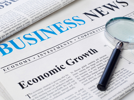 Economic growth headline on newspaperの写真素材