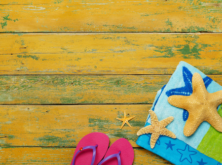 Beach accessories on woodの写真素材