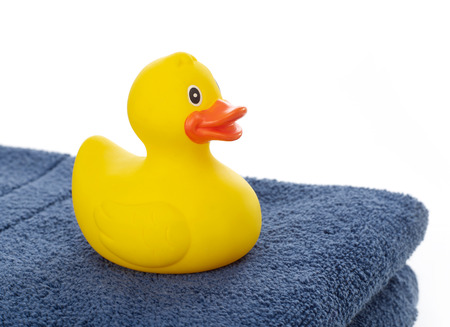 Rubber duck on towelの写真素材