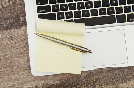 Adhesive note on laptopの写真素材