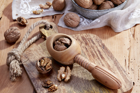 Walnuts and nutcracker close-upの写真素材