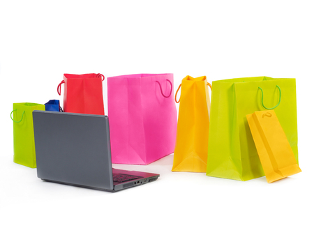 Laptop and shopping bagsの写真素材