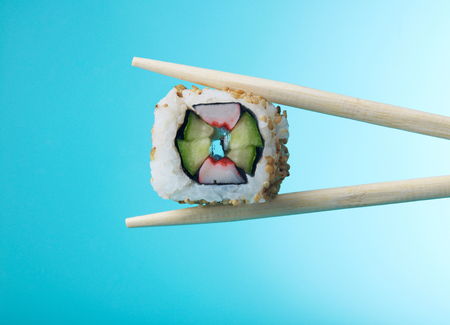 Chopsticks with sushiの写真素材