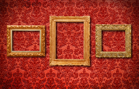 Antique frames on wallpaperの写真素材