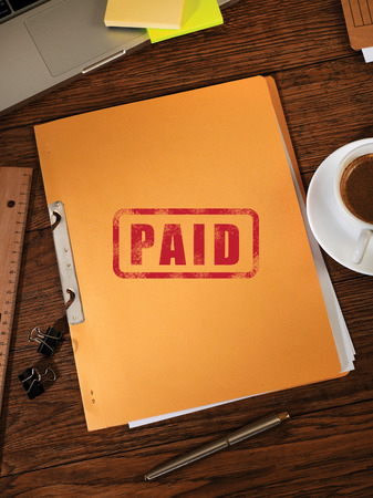 Paid folders on desk
の写真素材