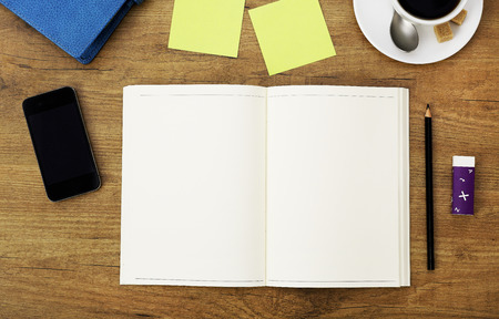 Blank notebook on a working desk