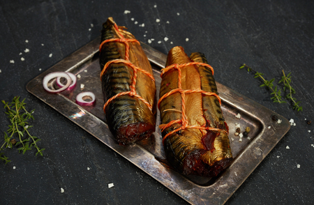 Smoked Mackerel on blackの写真素材
