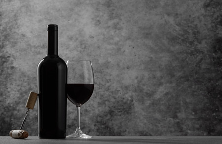 Red wine bottle and glassの写真素材