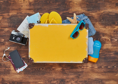 Packing for vacation concept from aboveの写真素材