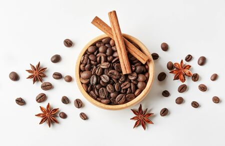 Flavored coffee beans in a wooden bowlの写真素材