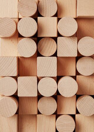 Circle and square wood cubes backgroundの写真素材