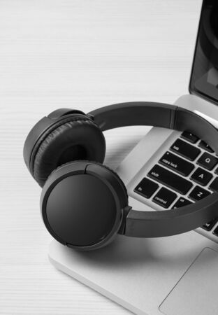 Wireless headphones on the tableの写真素材