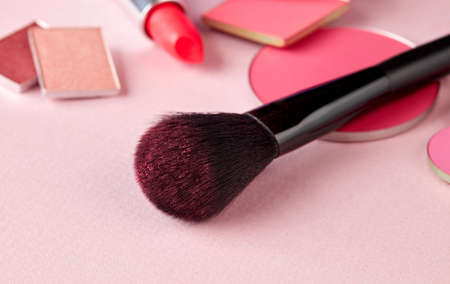 Make up brush with brush  of colored make up powder